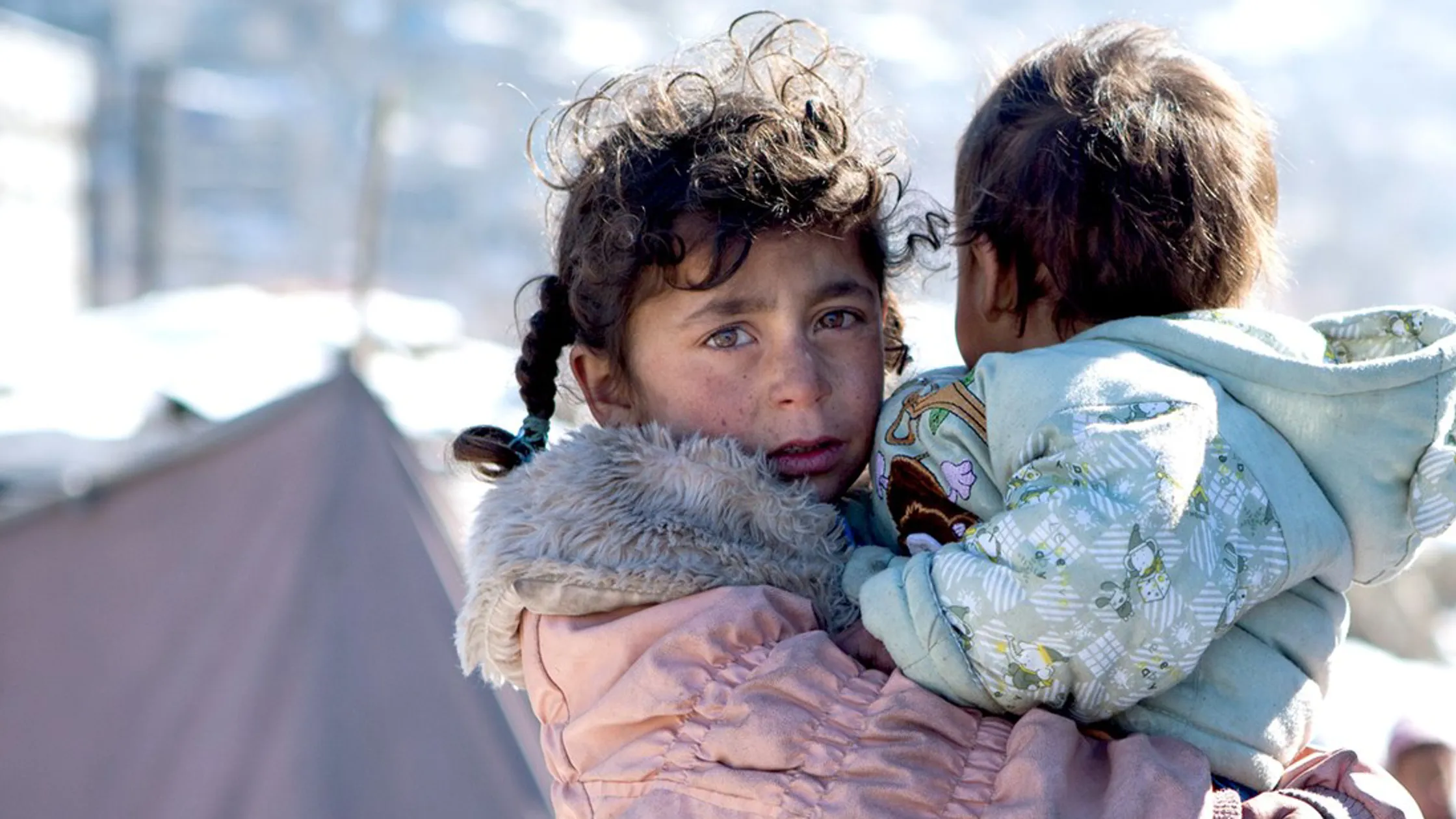 Refugeee girl with sister